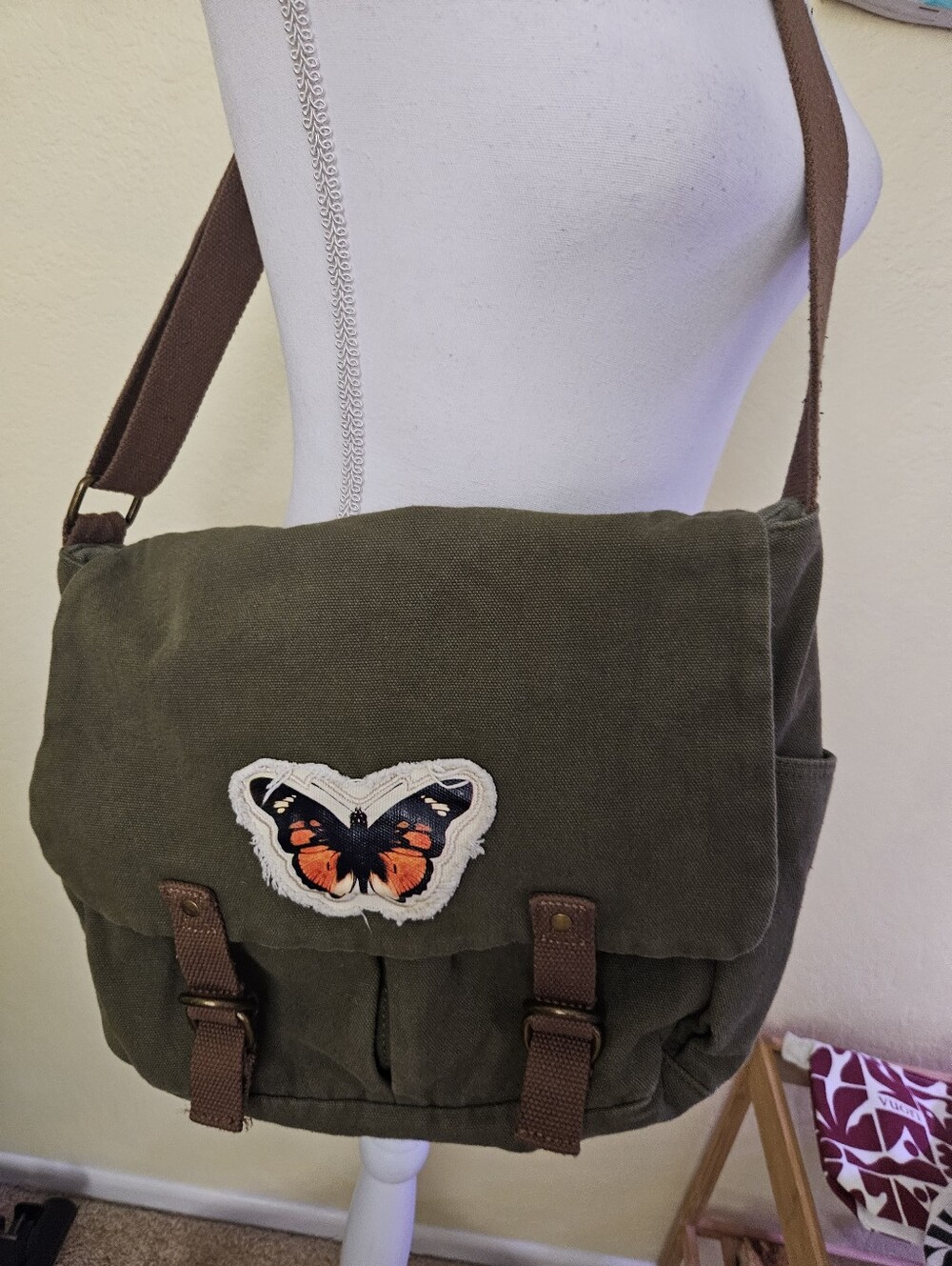 Olive butterfly Messenger cross body bag.